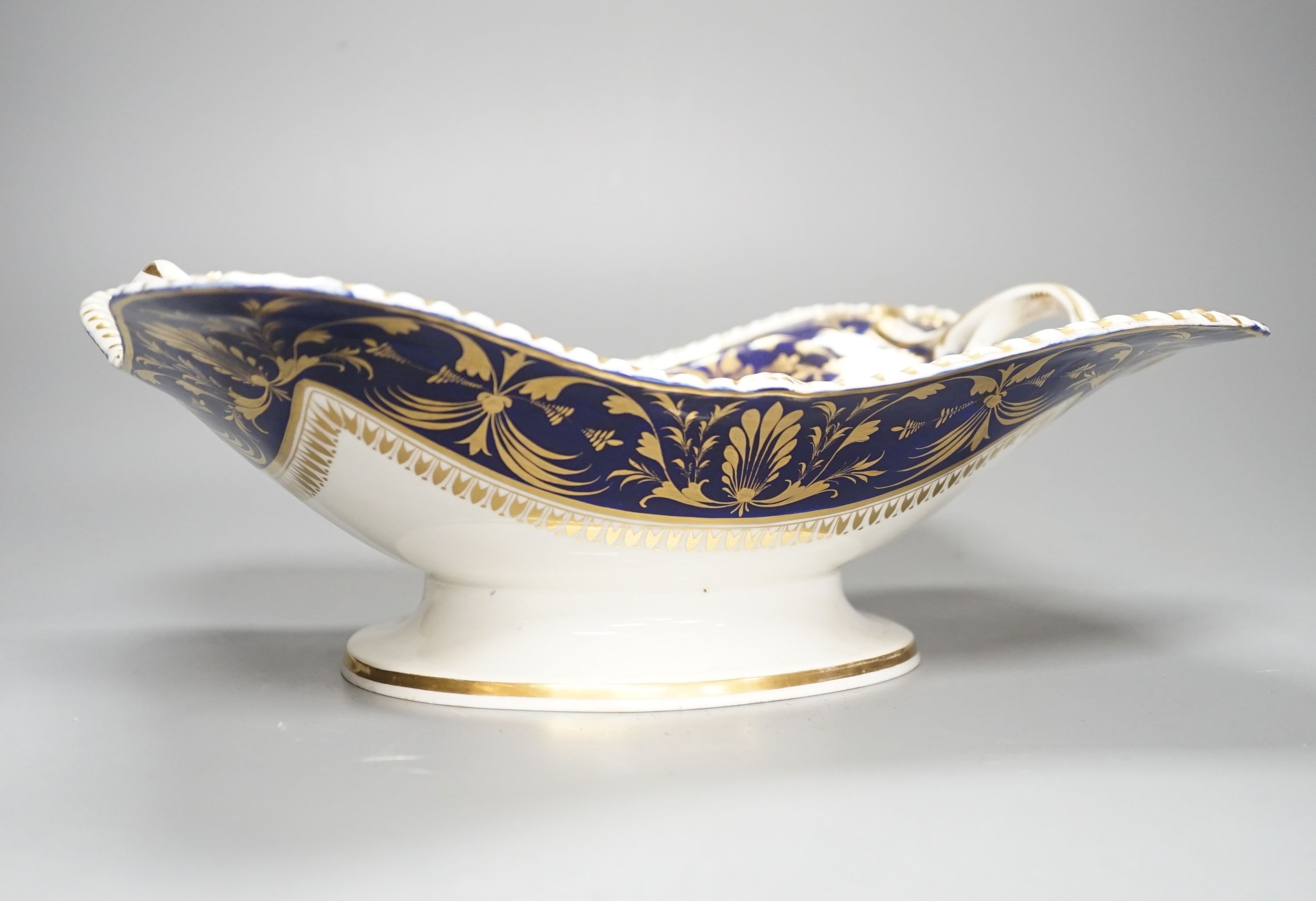 A Derby two handled pedestal dish with a named view of Sterling Castle, under a blue and gilt border probably by Daniel Lucas, c.1815, width 29cm